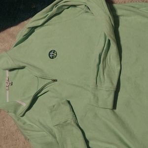 Beautiful light green quarter zip with amazing scenic golf course embroidery